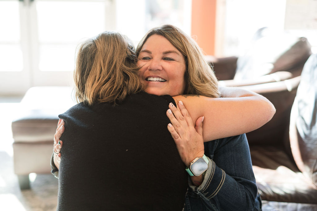 Two women hugging