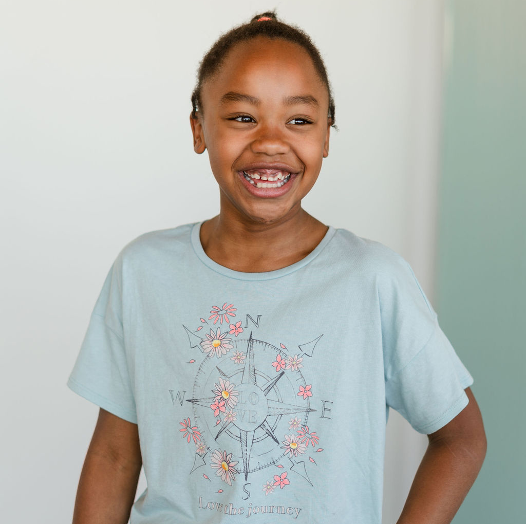 Young Black girl smiling